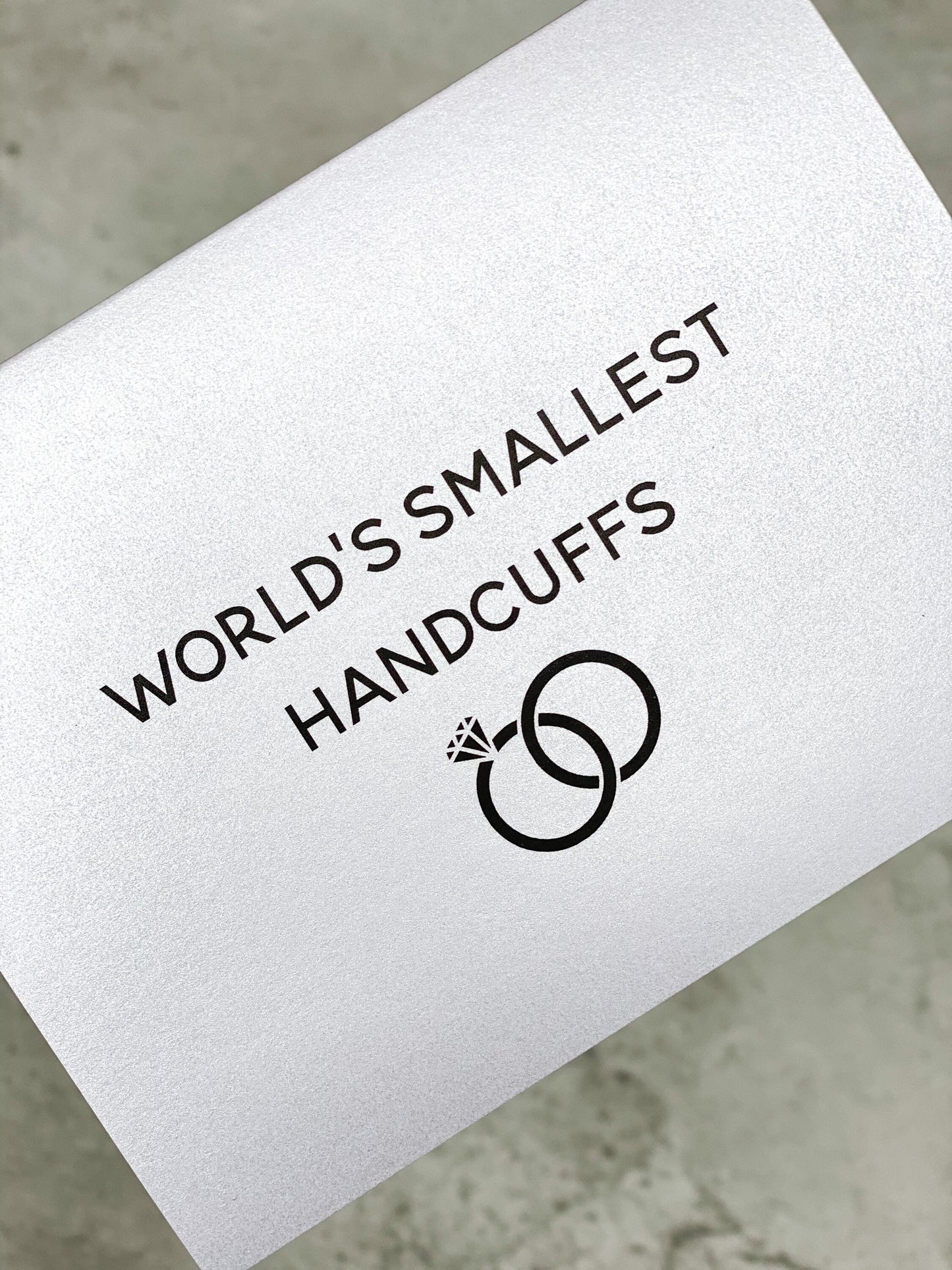 World’s smallest handcuffs card